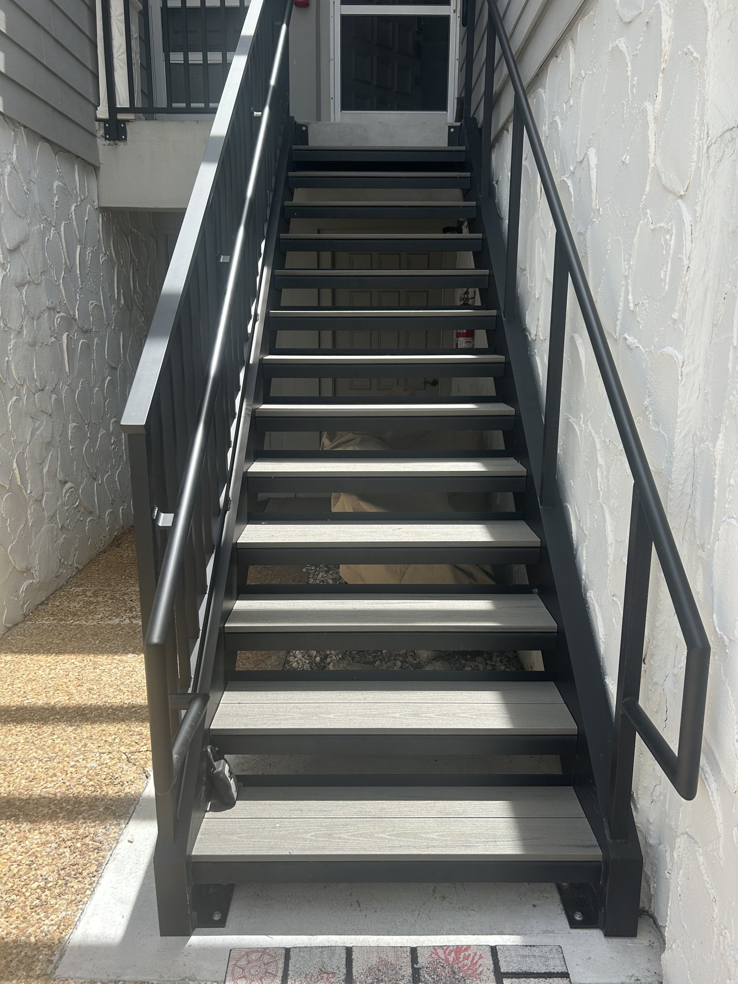 Stairs up to the condo entry